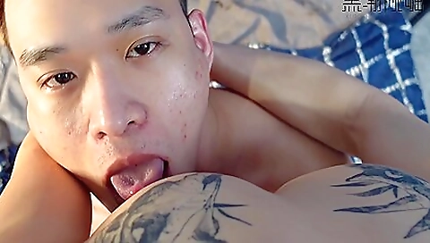 Asian with tattoos and a deepthroat in a hot amateur film