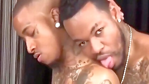 Deepthroating and black dildo for a black tattooed girl