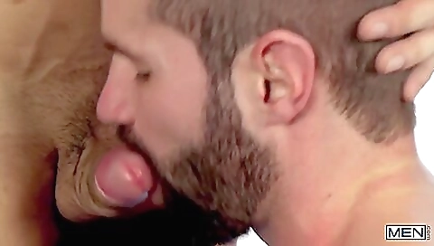 Luscious brunette deepthroats a big dick in the bed
