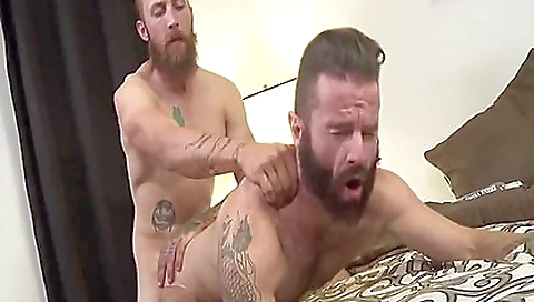 Big cock tattooed with a long hard shaft in amateur video