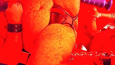 Tattooed girl gets fucked by a strapon and dildo in a sling