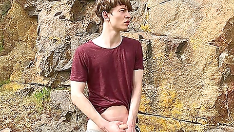 Big cock young man is outdoors showing off his skills